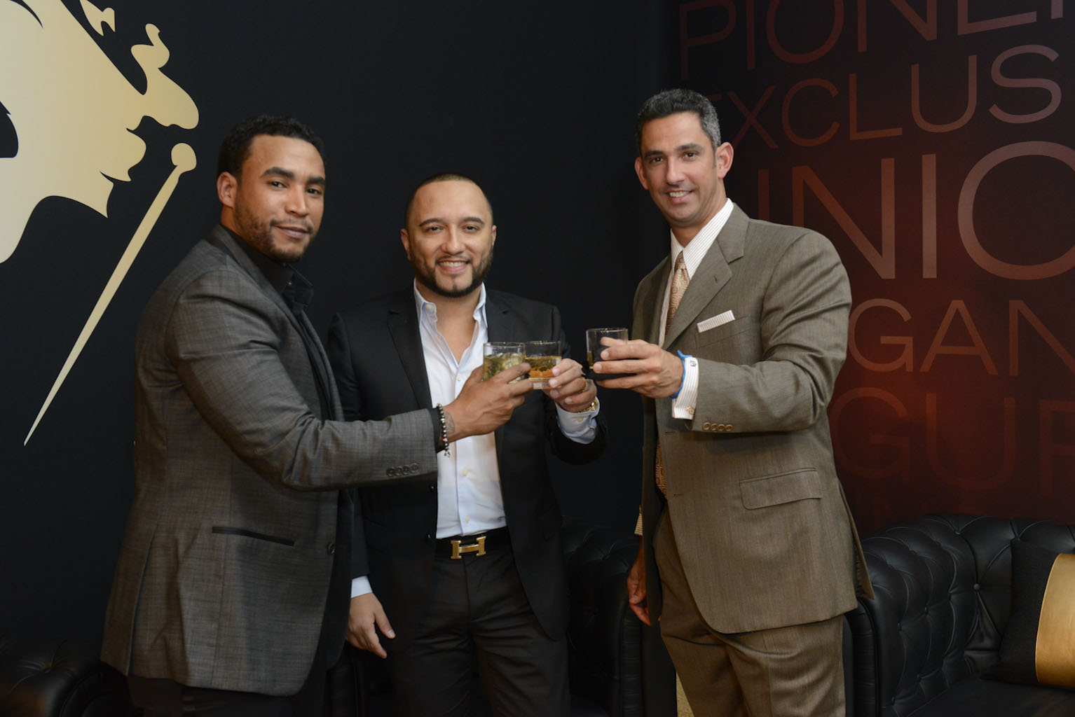 Three men cheersing at a Johnnie Walker Event