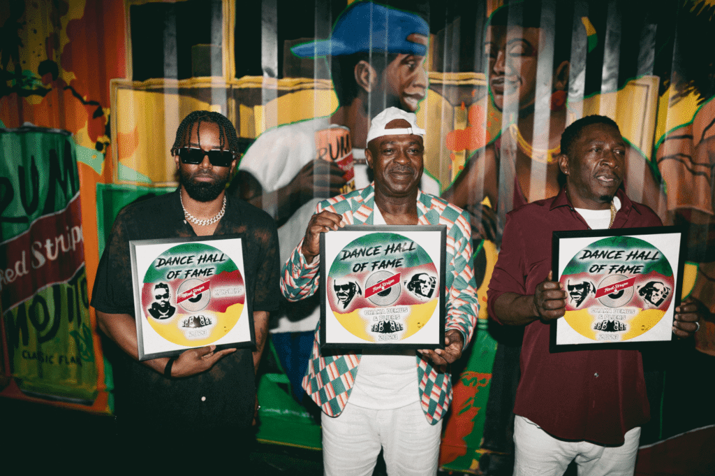 Three men accepting awards for Dance Hall of Fame for Red Stripe brand